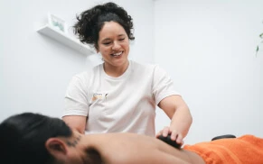 staff member giving remedial massage