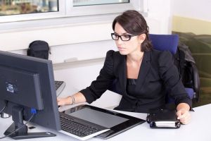 bookkeeper sitting in front of the computer