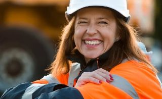 Altius Group women in hard hat smiling